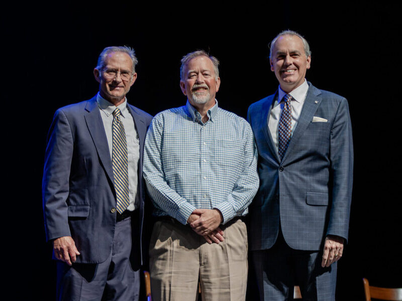 HRA Director of Alumni Relations Tommy Yevak '83, Alumni Service of the Year Award winner John Stout '82, and Head of School Jay Lasley